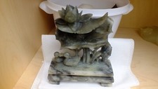 Soapstone carving ducks under