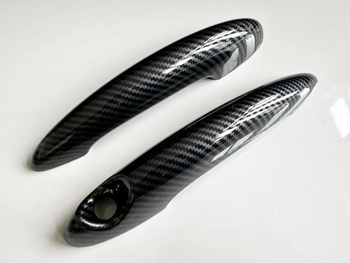 Carbon effect door - door, handle