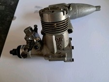 OS MAX .25 R/C MODEL AIRCRAFT GLOW ENGINE COMPLETE WITH SILENCER.