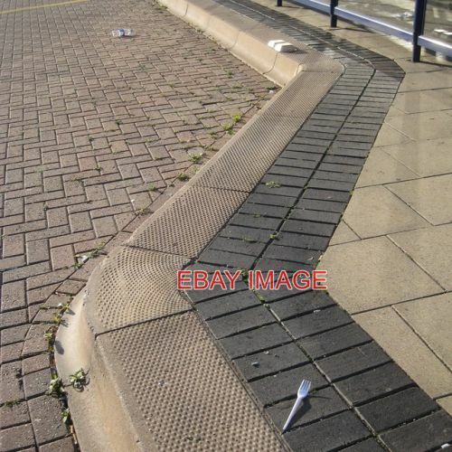 Photo kerb and - and, bus