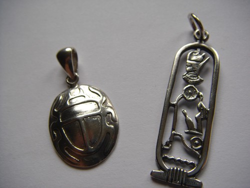Two egyptian silver - two, scarab
