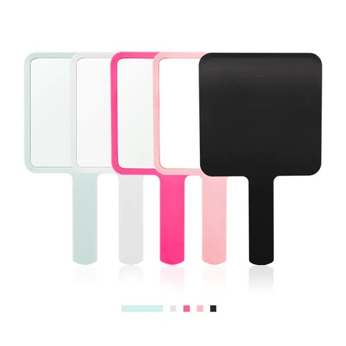 Hand held makeup mirror - hand,