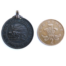 An early bronze Royal Life Saving Society award medal to A Godfrey Dec 1911
