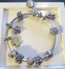 Pandora 925 ALE Silver bangle & 11 charms: Disney, New York Apple, Crown, Angel