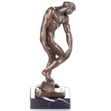 Bronze man sculpture on a