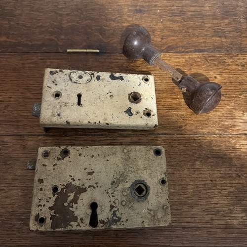 Two old door locks - old, and