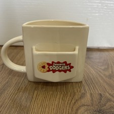 Jammie dodger biscuit holder mug. Cream With Slot For Biscuit, Half Moon Shape
