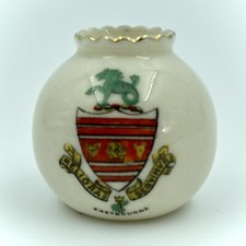 SWAN CRESTED CHINA BALL VASE WITH EASTBOURNE - MATCHING CREST FOR CARTER AND CO