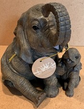 Elephant & Baby Calf Out Of