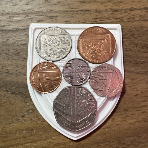 Royal shield british coin - shield,