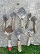 vintage walling trowles, old school masonry tools
