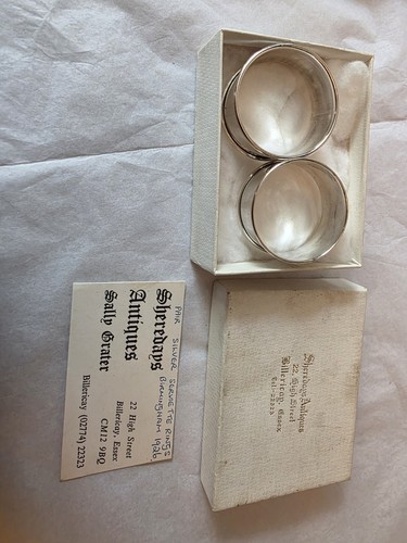 Pair sterling silver napkin - of,