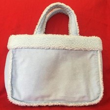 Unused M&S pale blue suede-effect and lambs wool-effect handbag.