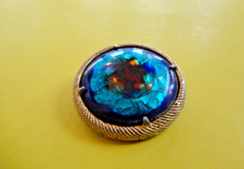 VINTAGE SPHINX ROUND BLUE FOIL AND ENAMEL GOLD TONE BROOCH