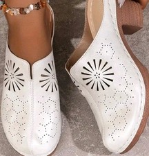 Size 4.5 Mules. Ivory White
