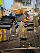 scalextric large bundle of track, fencing, handsets and power packs