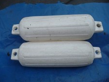 A pair of boat fenders by