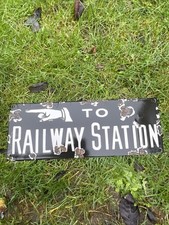 To Railway Station Enamel Sign
