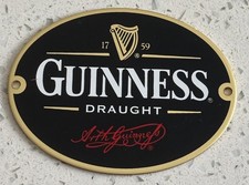 New guinness oval brass - a,