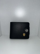 Black leather Ferrari bifold wallet with snap closure and coin pocket