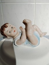 Bisque Piano Baby On Back