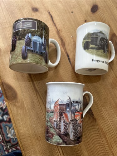 Three mugs with - with, design