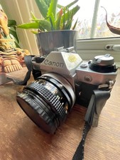 Canon AE-1 Program 35mm SLR Film Camera with 50mm f/1.8SC lens Kit