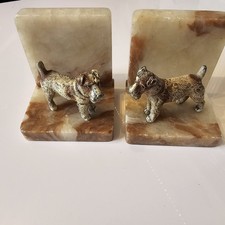 A Pair of 1930s Alabaster and Cast Iron Wire Hair Terrier Dog Bookends
