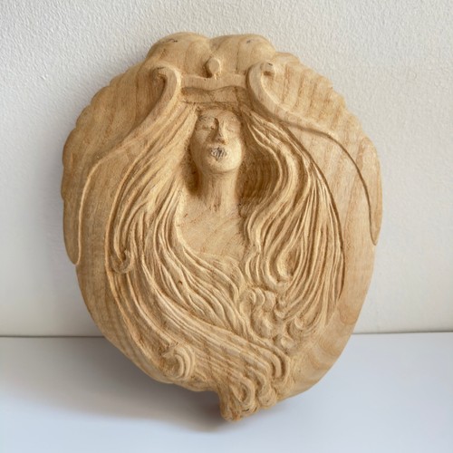 Vintage hand carved woman with