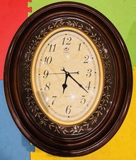 wooden-framed wall clock.