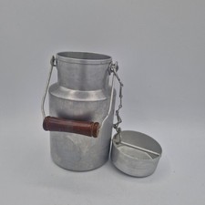 Vintage old aluminium milk