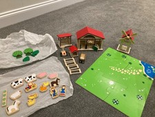 Wooden farm set with animals, buildings, windmill and tractor