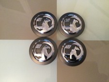 4x Genuine totally unmarked Vauxhall Astra J 60mm Alloy Wheel Centre Caps x4
