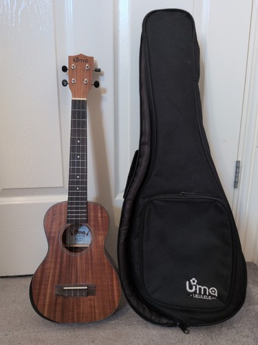 Uma baby ukulele with - uma,