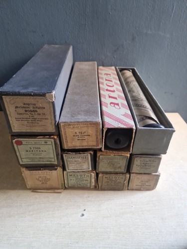Vintage pianola rolls - x,