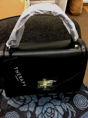 Therapy hand bag house of - hand,