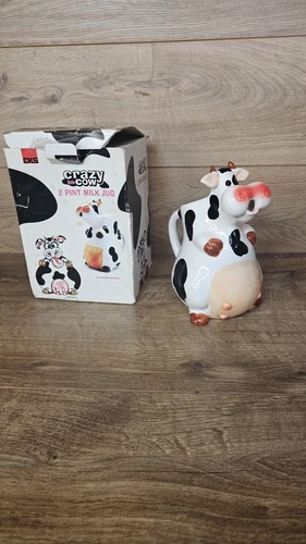 Cow milk jug - milk,
