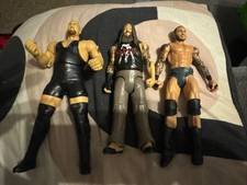 Three WWE Figures The Big Show Randy Morton and Bray Wyatt Collectible