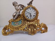 A modern Reproduction of an Early 19th French mantel Clock with Metal Case