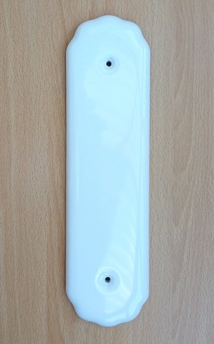 White ceramic door - x, finger