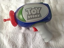 TOY STORY HANDHELD LCD VIDEO GAME BUZZ LIGHTYEAR BLASTER GUN DISNEY WORKING