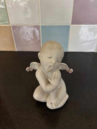 Lladro tired figurine - lladro,