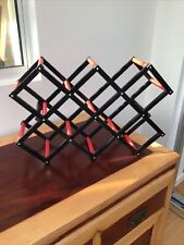 Wine Rack. Folding Black, Red Plastic Concertina Accordion Expanding Collapsible