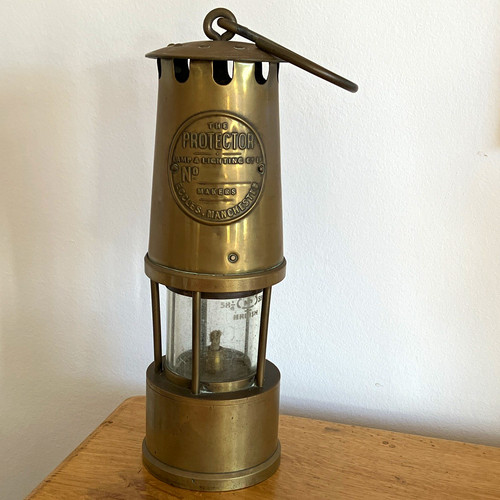 Protector vintage brass miner - vintage,