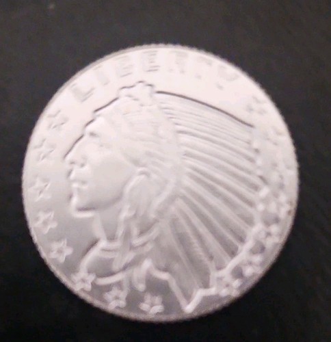 Incuse indian round silver - incuse,