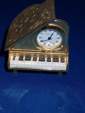 Park Lane Cottage Clock Brass in coloured needs new battery