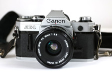 Canon AE-1 SLR 35mm Camera Good Working with Canon FD 35mm f2.8 Prim Lens