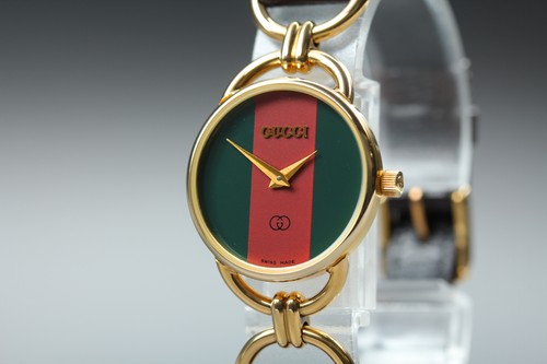Near mint gucci 6000l gold - gucci,
