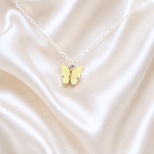 Pale lemon yellow butterfly - pale,
