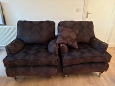 Two MultiYork armchairs upholstered in black velvet. Deep seats. 